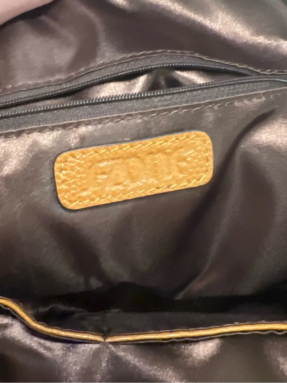 Classic Tan Pebbled Leather Backpack with Front Zip Pockets